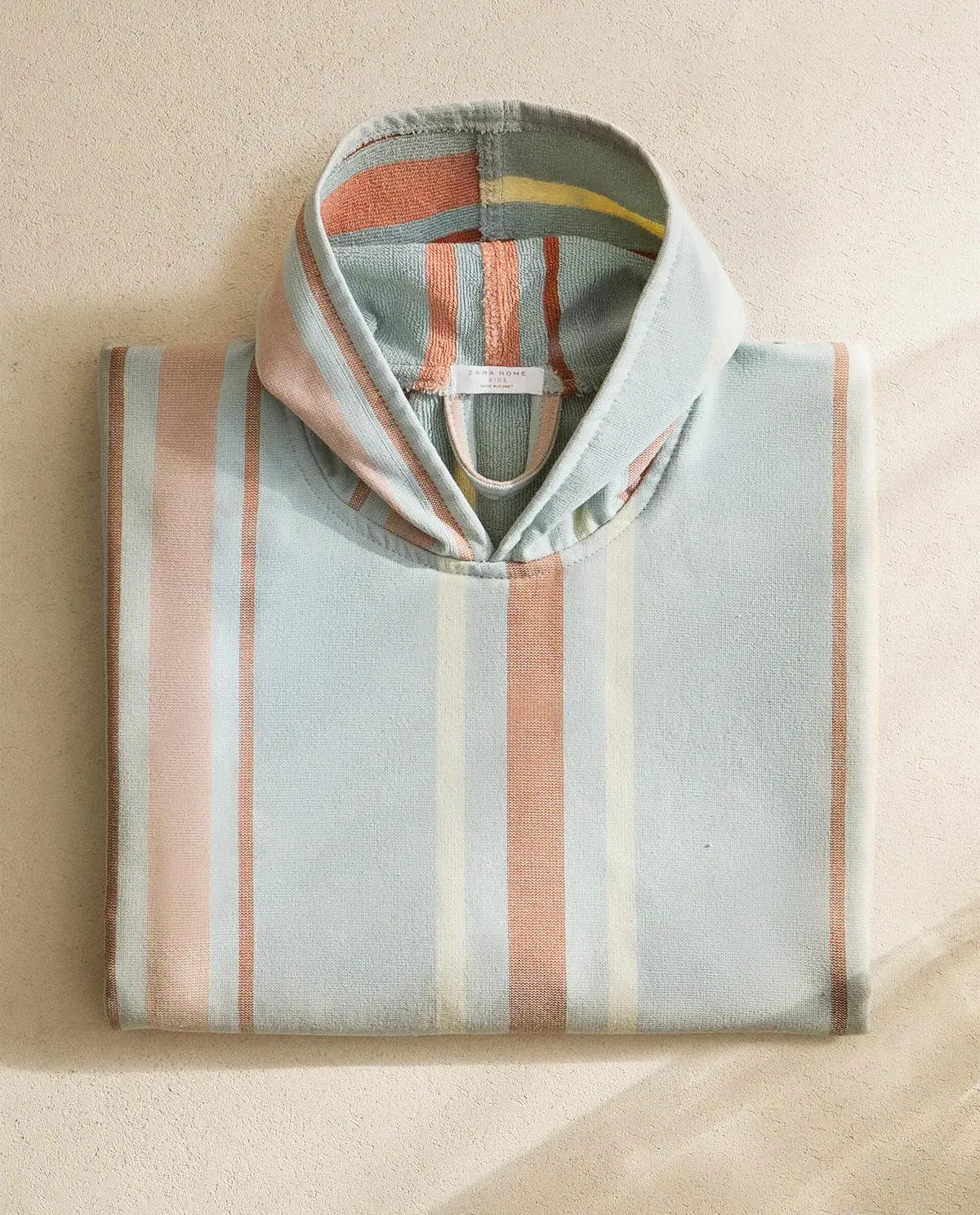 HOODED PONCHO WITH STRIPES