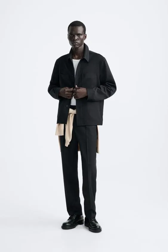 PLEATED TROUSERS
