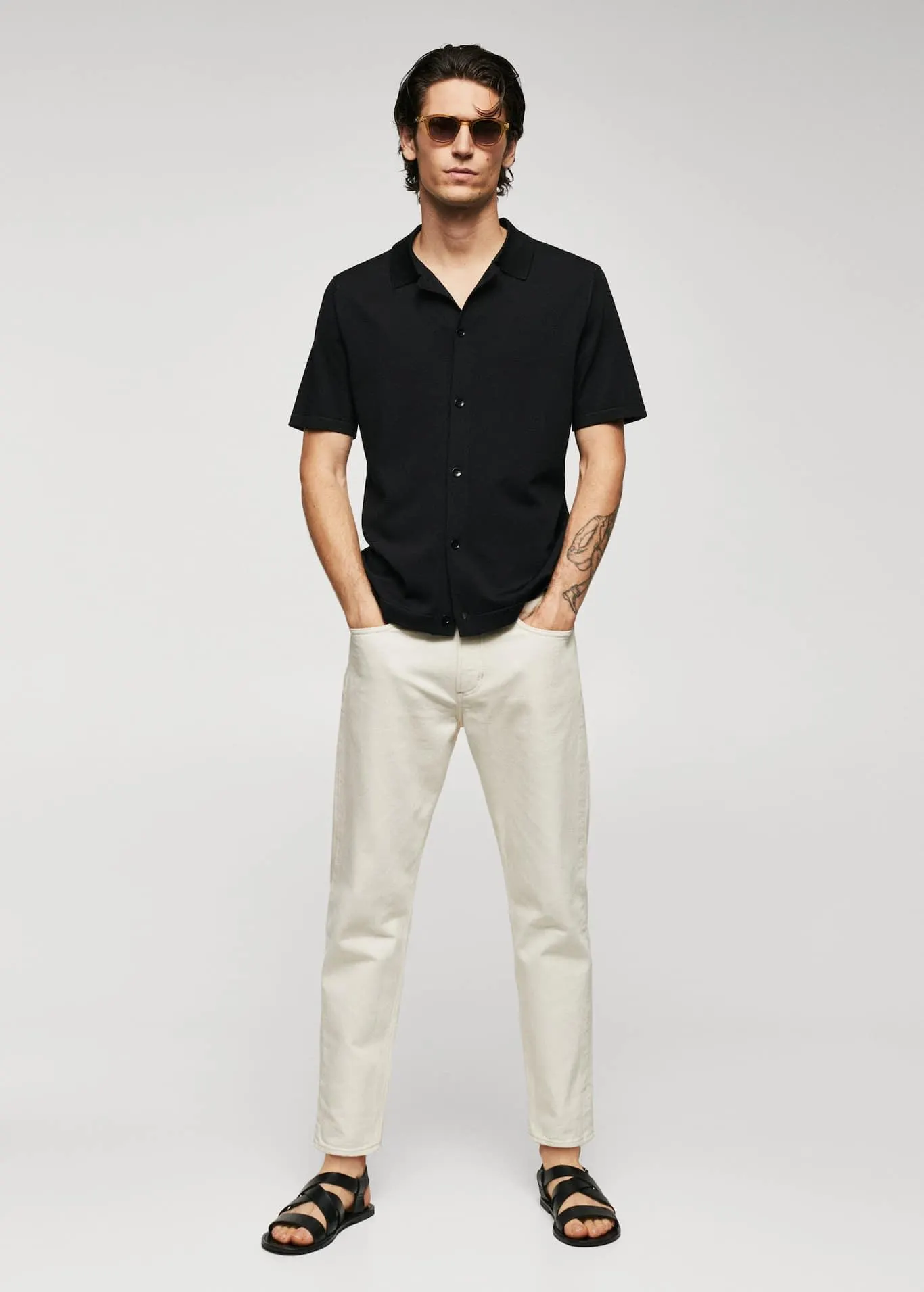 Buttoned micro-structure knitted polo shirt