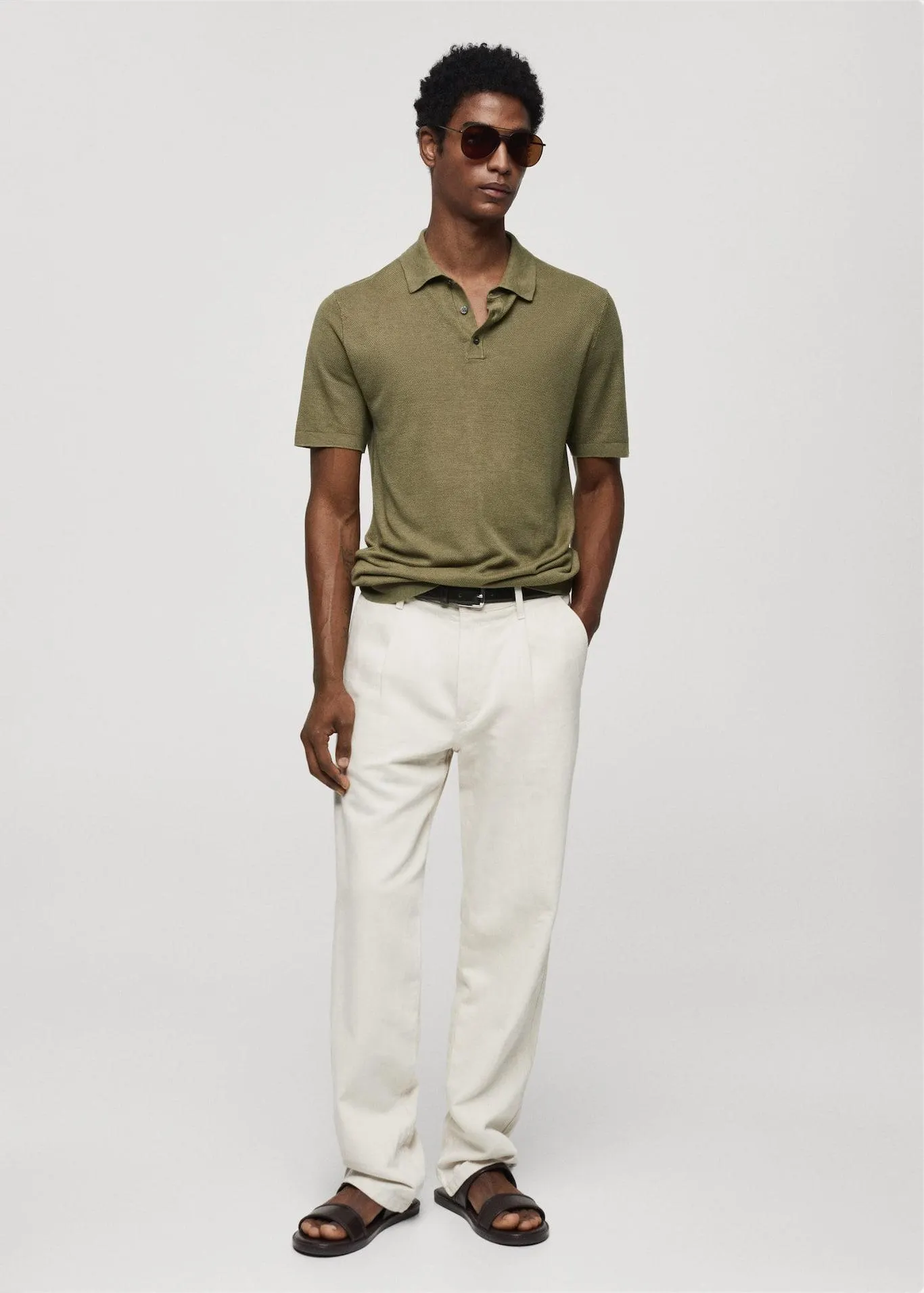 Buttoned micro-structure knitted polo shirt