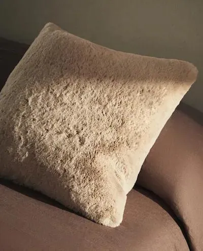 UPHOLSTERED FAUX FUR ARMCHAIR