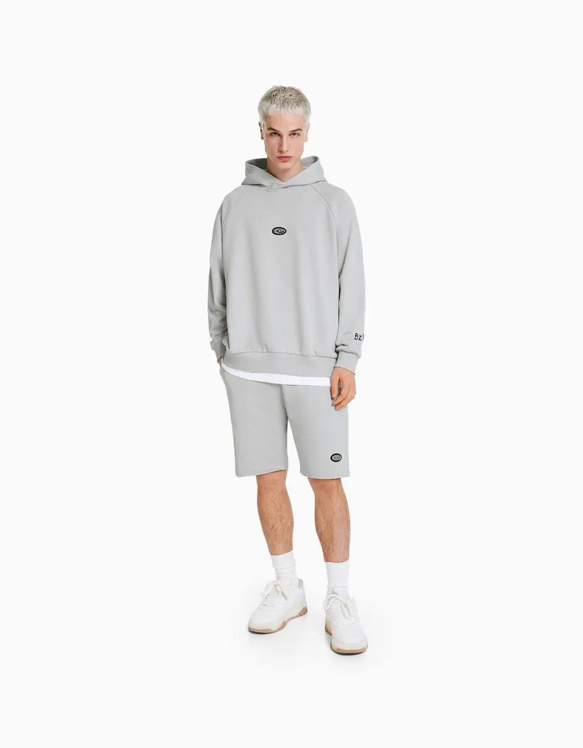 Plush BERSHKA ft. BIZARRAP Bermuda shorts with detail