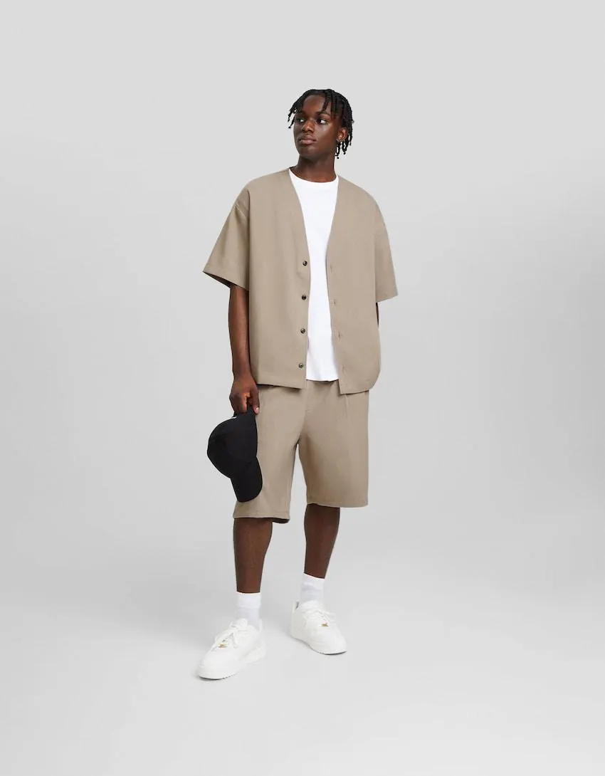 Wide-leg tailored Bermuda shorts