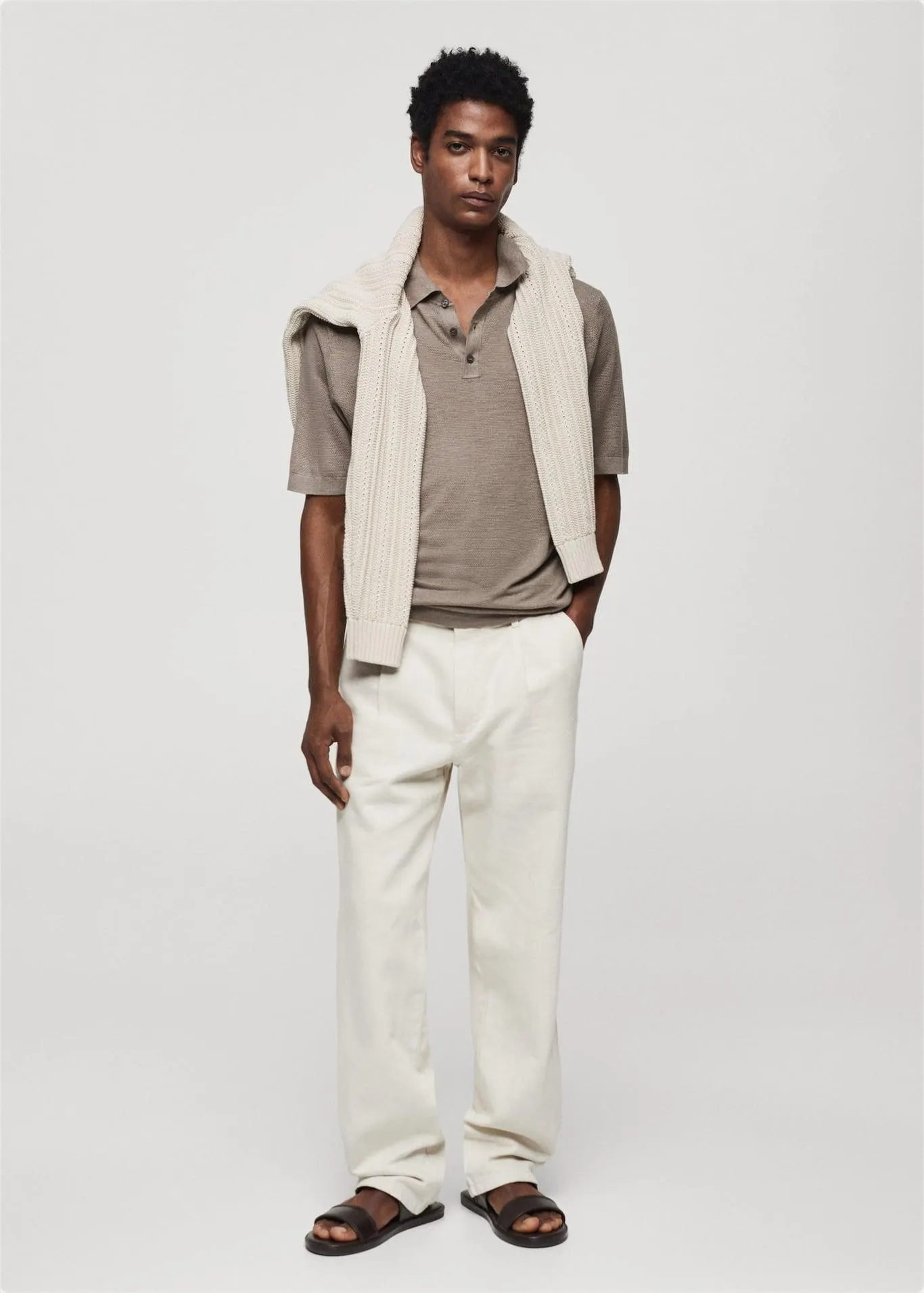 Buttoned micro-structure knitted polo shirt