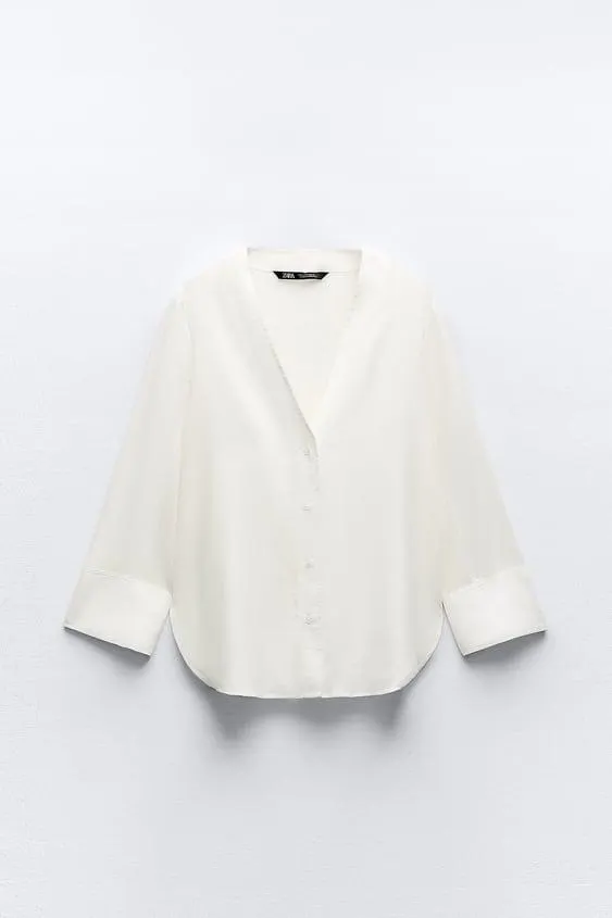 CAMISA ESCOTE PICO