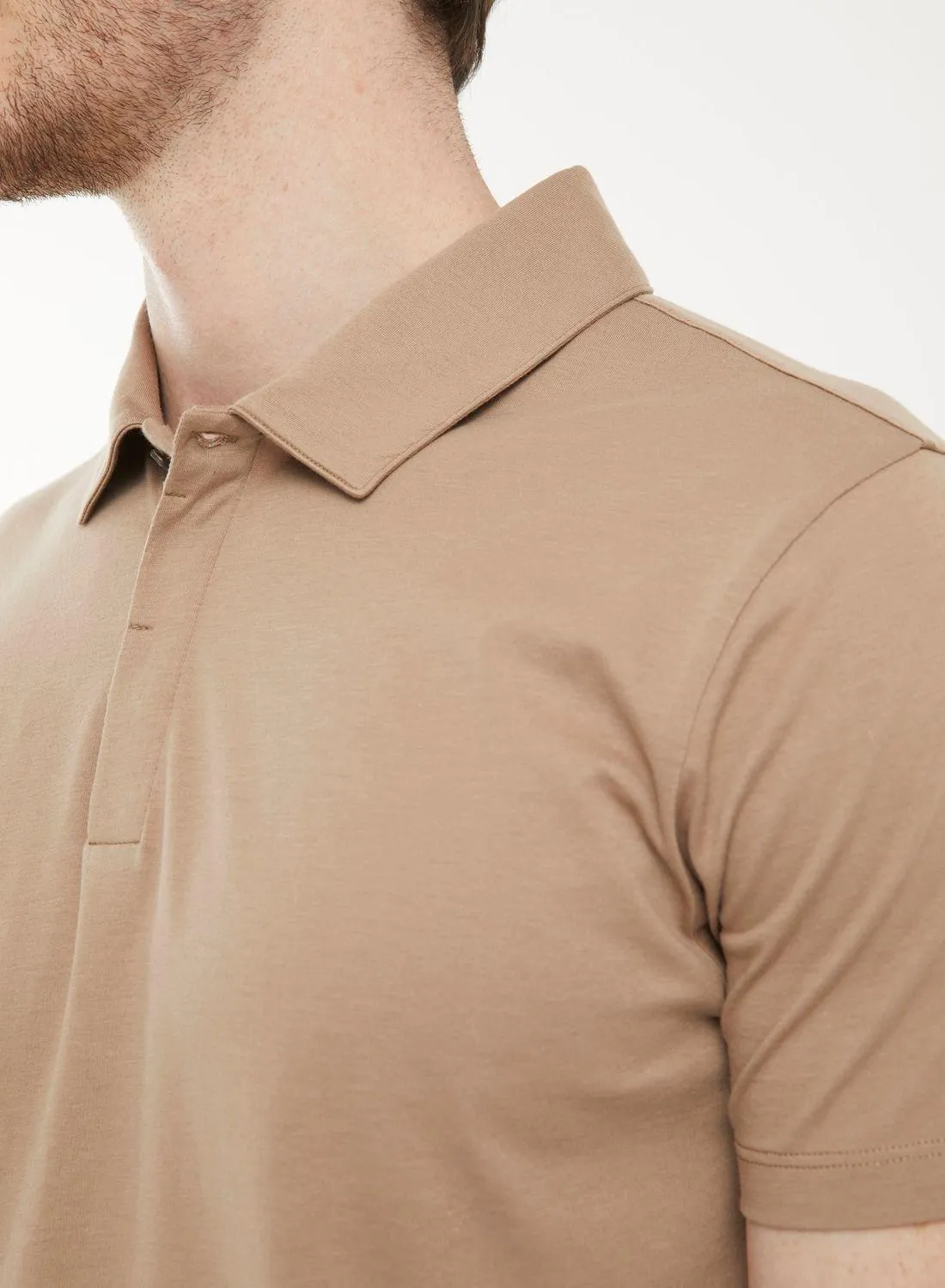 Chomba pima cartera tapada y botón