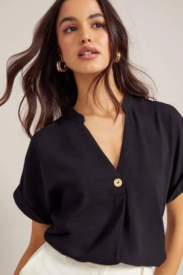 Friends Like These V Neck Roll Sleeve Button Blouse