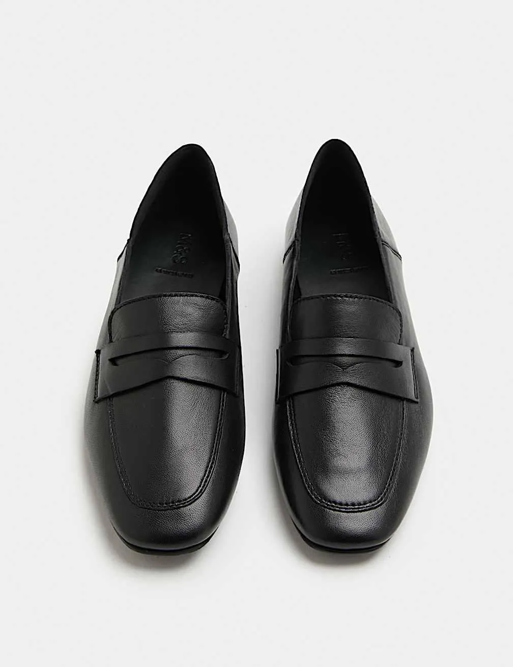 Flache Lederslipper mit Keilspitze