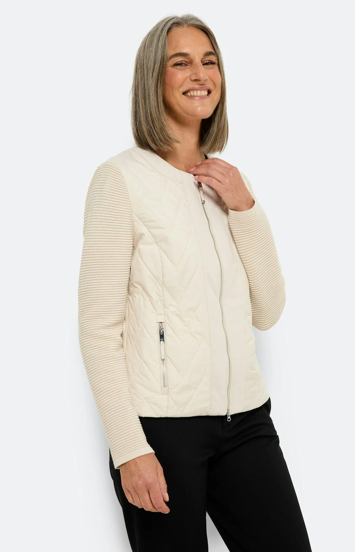 Steppjacke mit gestricktem Arm, beige