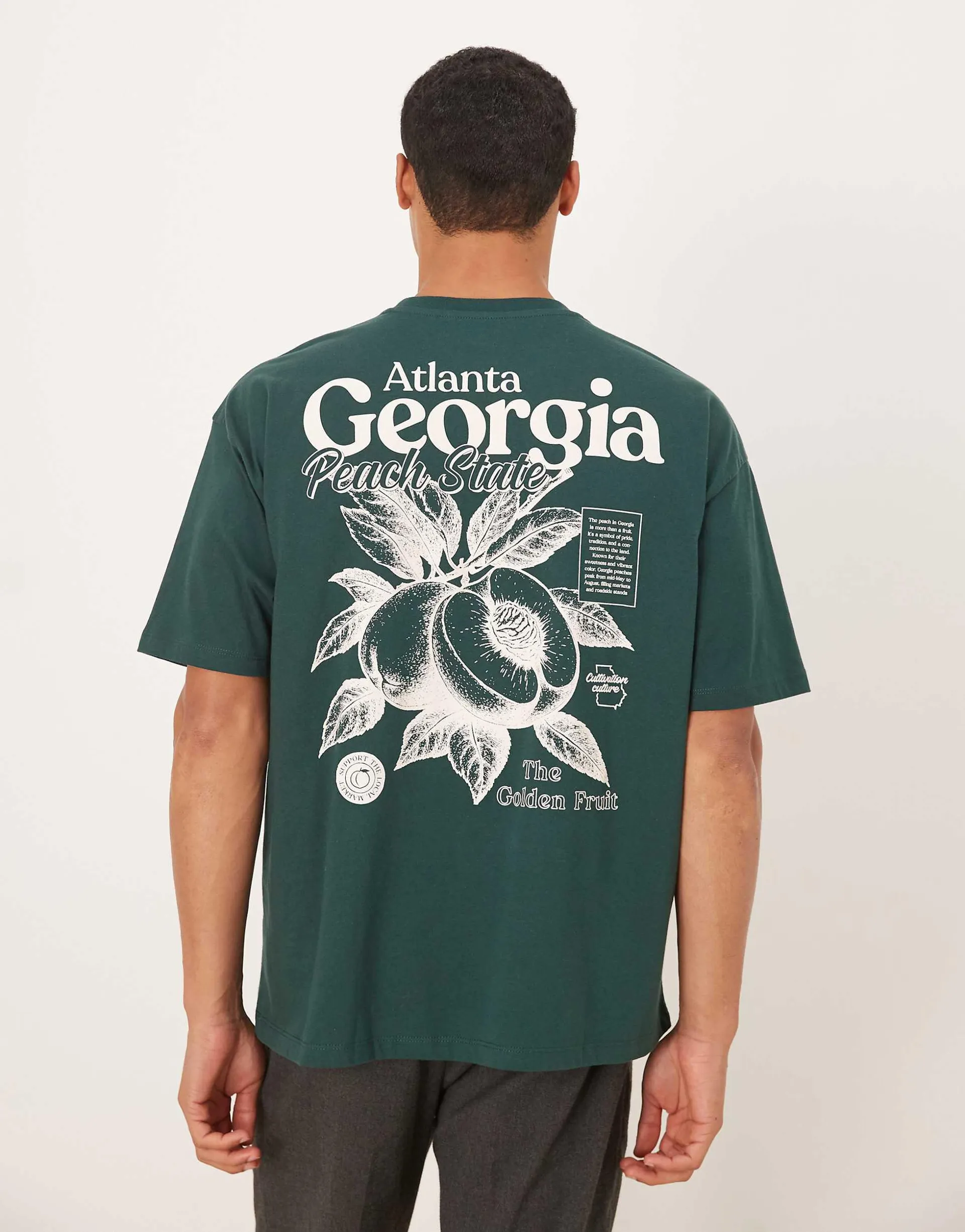 ASOS DESIGN oversized t-shirt with fruit graphic in dark green