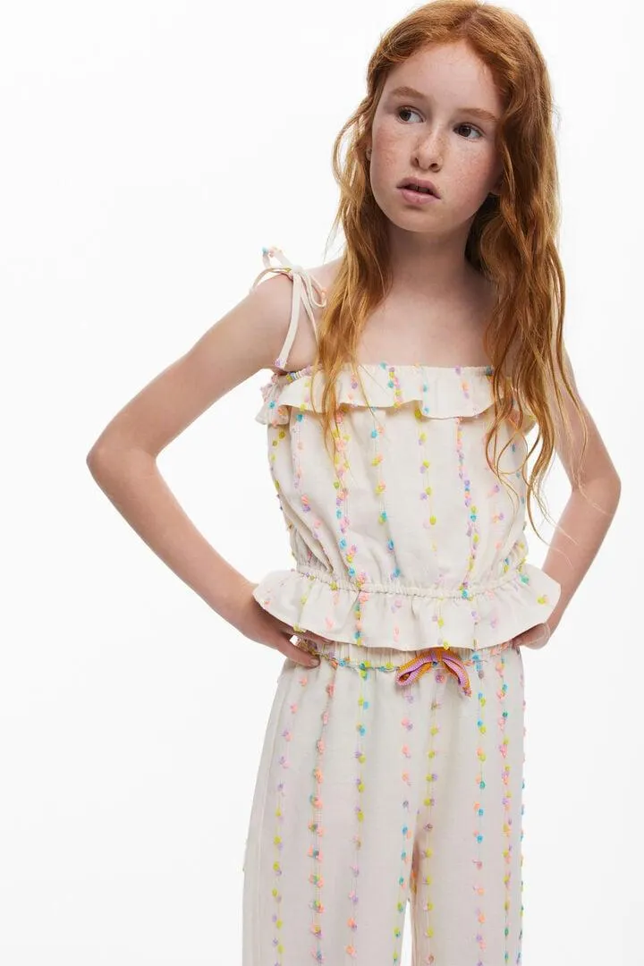 Trägertop mit Pompons