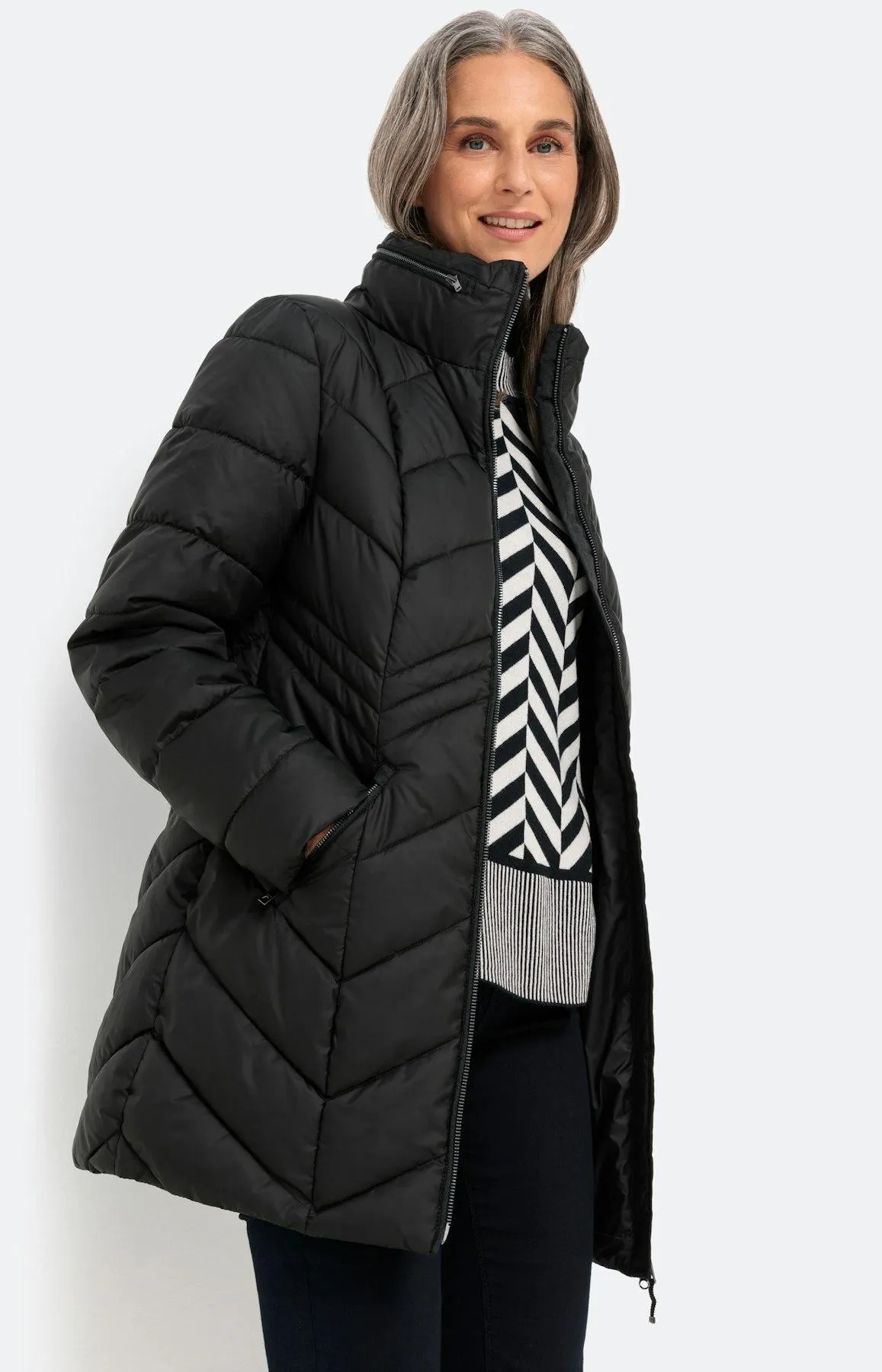 Steppjacke mit versteckter Kapuze