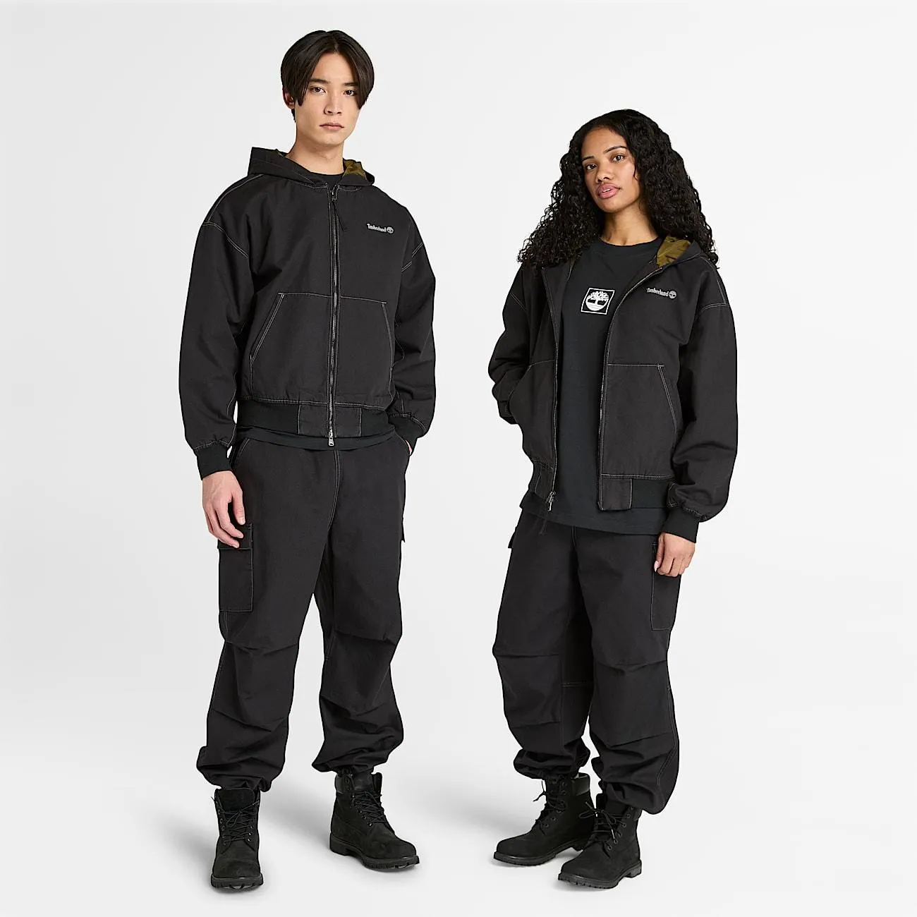 All Gender Bomberjacke aus gewaschenem Duck-Canvas mit Kapuze in Schwarz