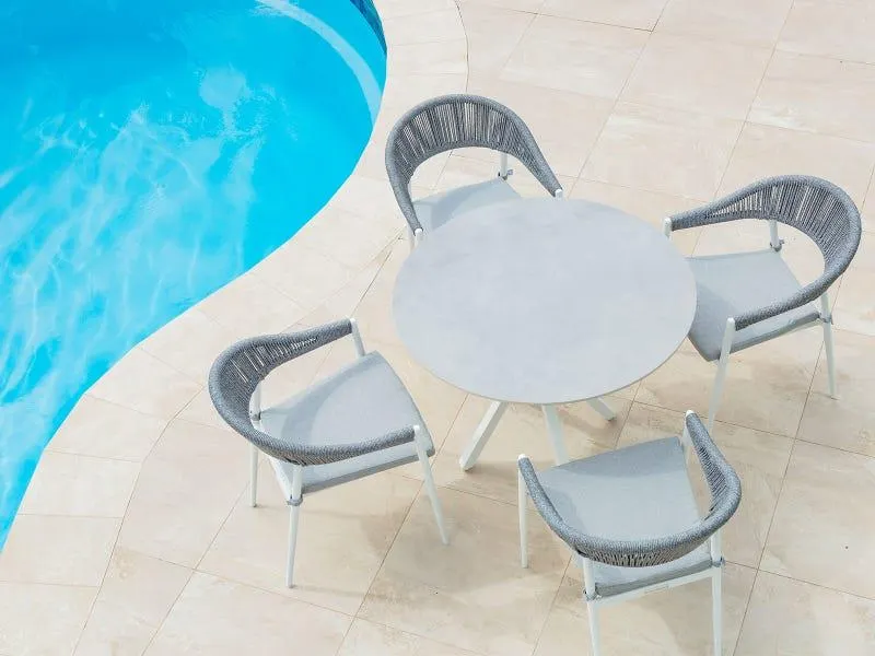 Adele Round Ceramic Table with Nivala Chairs 5pc Outdoor Dining Setting