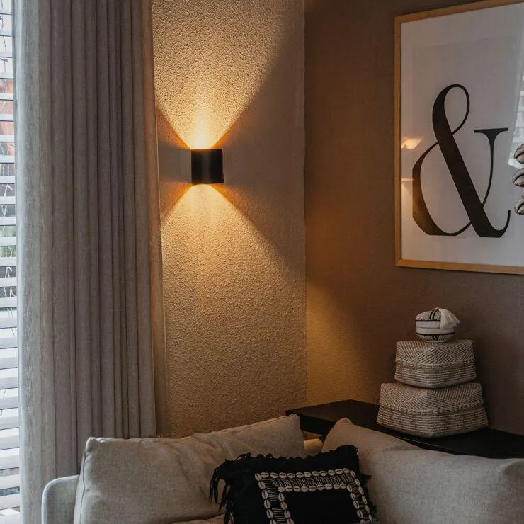 Moderne wandlamp zwart met messing - Sabbio