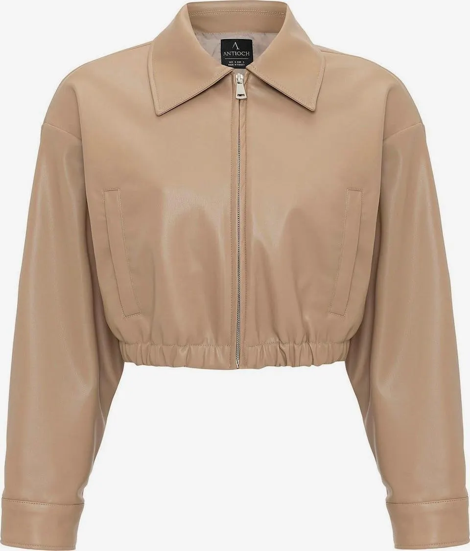 Antioch Tussenjas in Sand