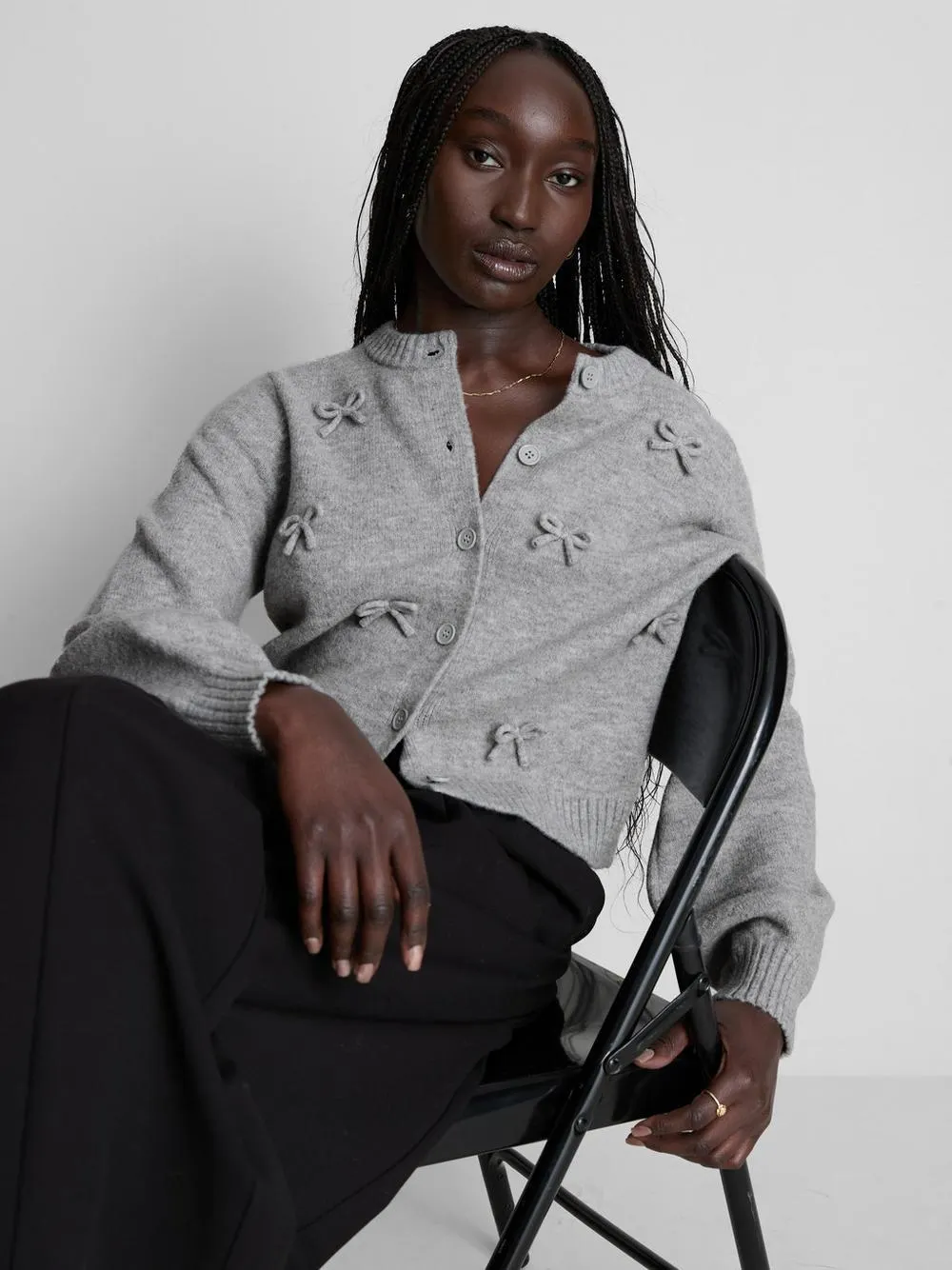 Cardigan lavorato a maglia con fiocchi