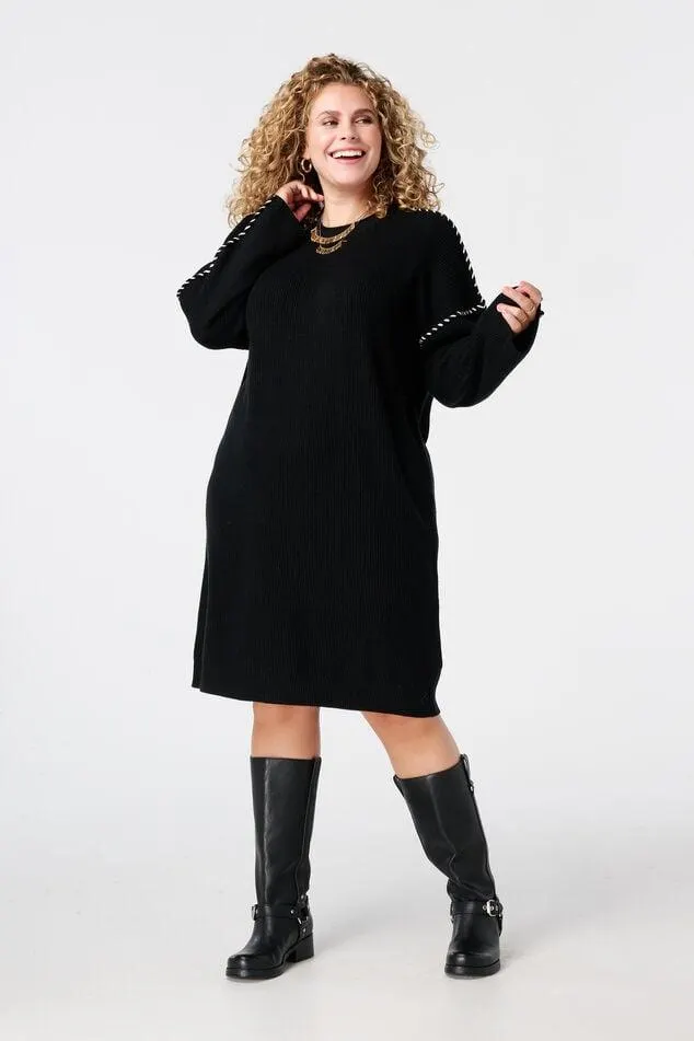 Gebreide jurk met sierstiksels