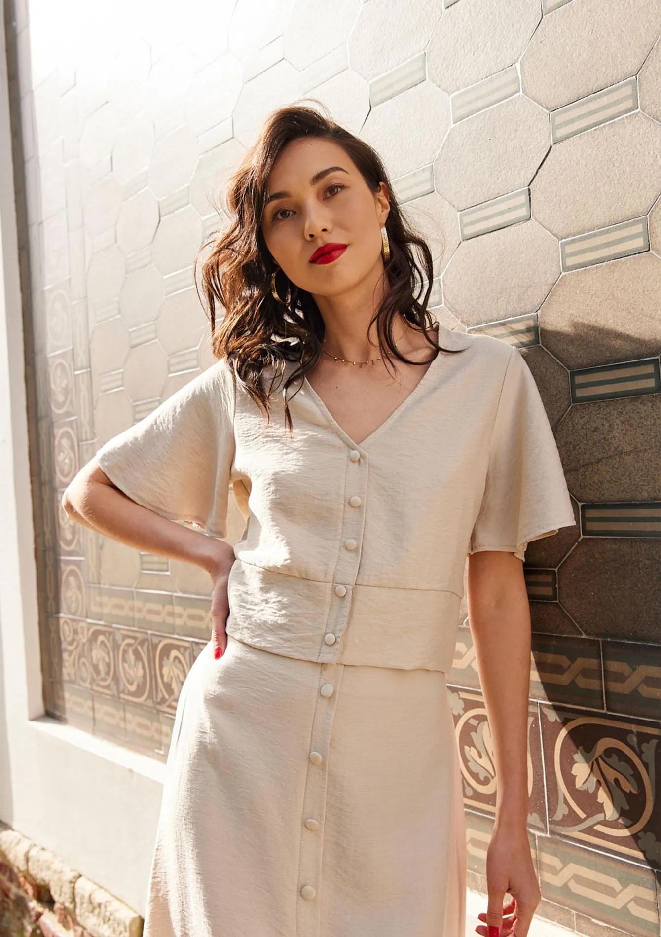 Top with butterfly sleeves