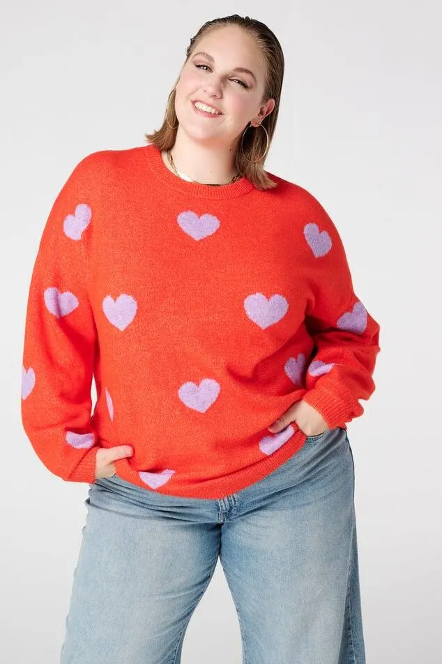 Gebreide trui met hartjespatroon