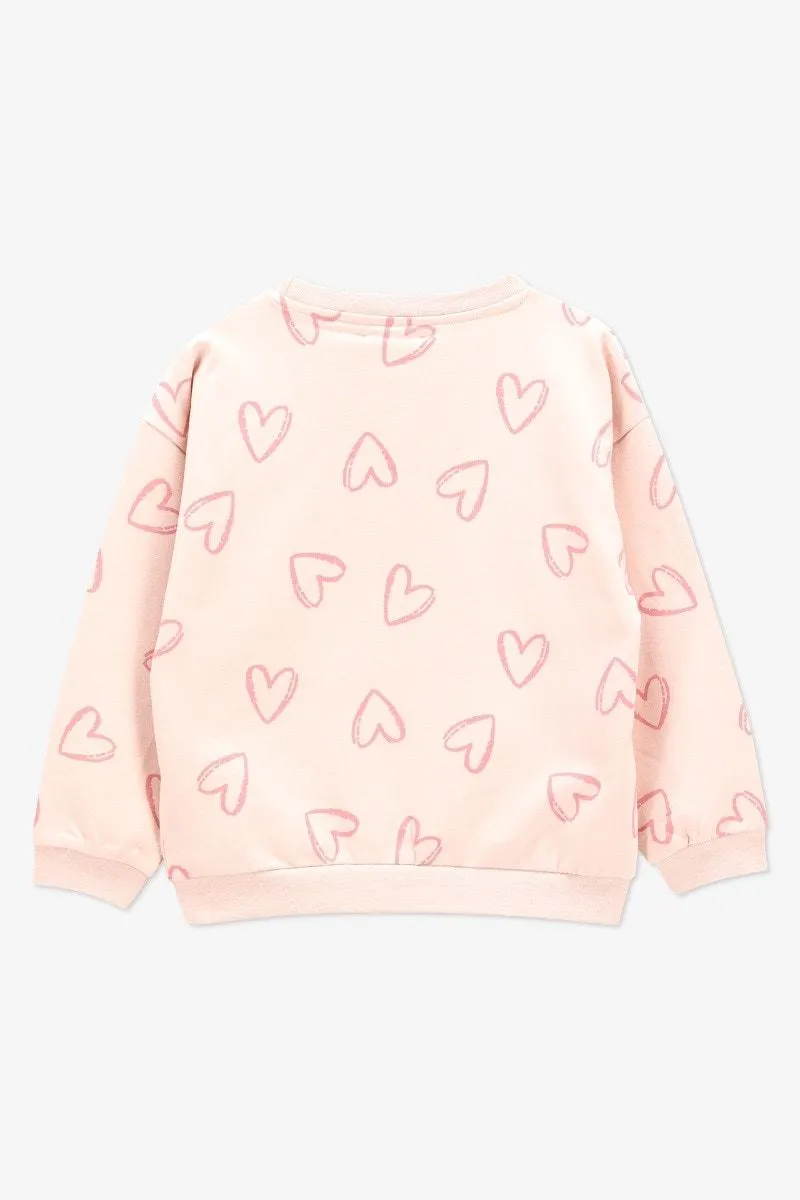 Lichtroze sweater met hartjes