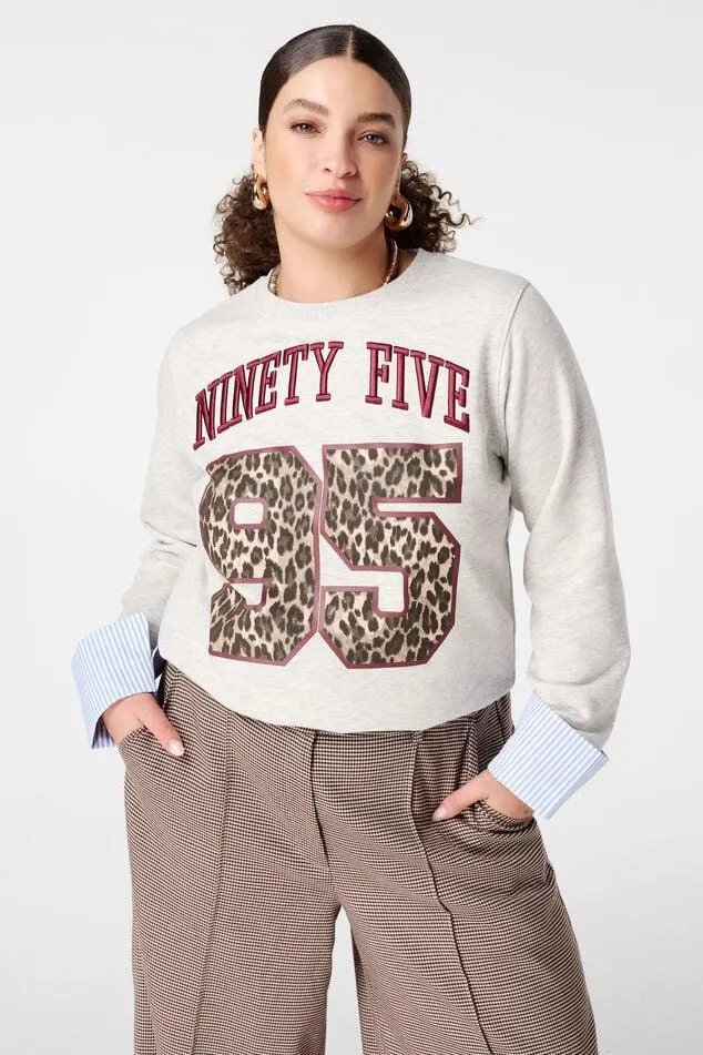 Sweater met blouse details