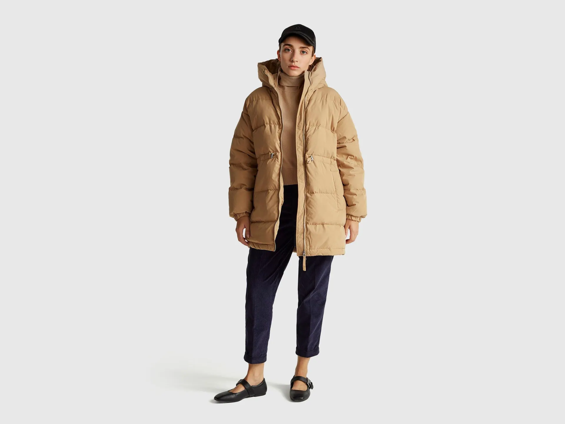 Long down jacket padded with recycled feathers