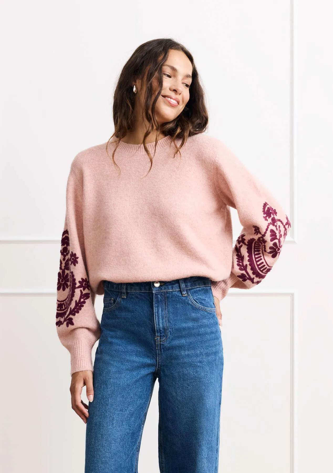 Embroidered sleeve statement knit