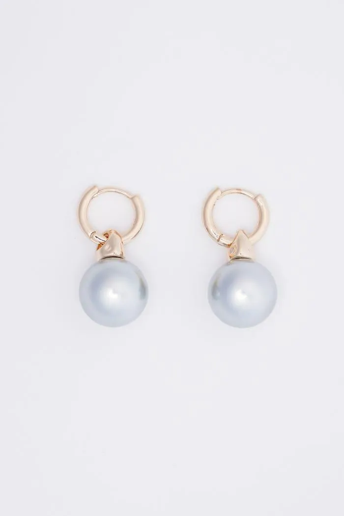 Oorbellen ringen met grote parel