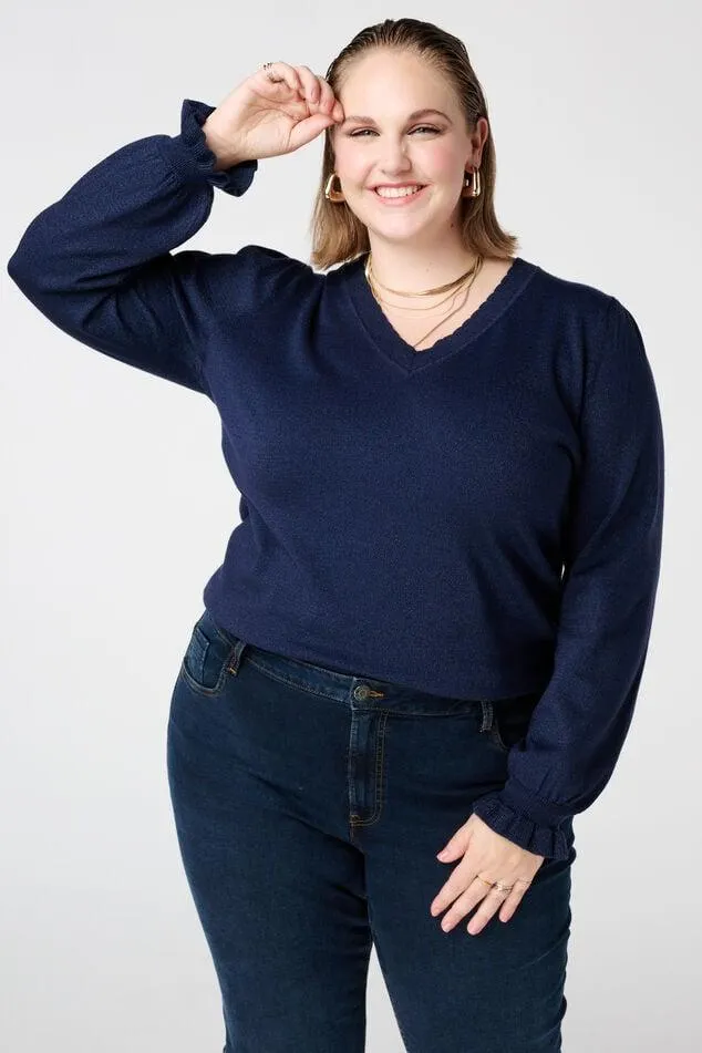 Lurex trui met ruffle mouw