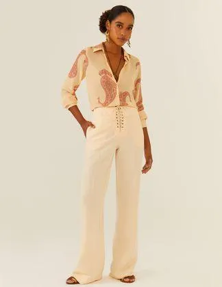 Calça Ilhós Rolotê