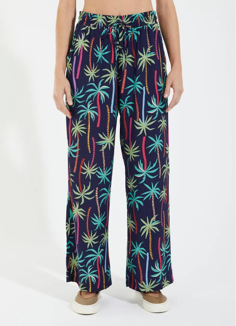 Calça ampla estampada coqueiral azul marinho