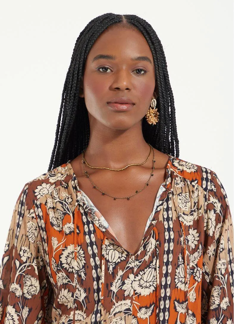 Vestido curto estampado ornamental