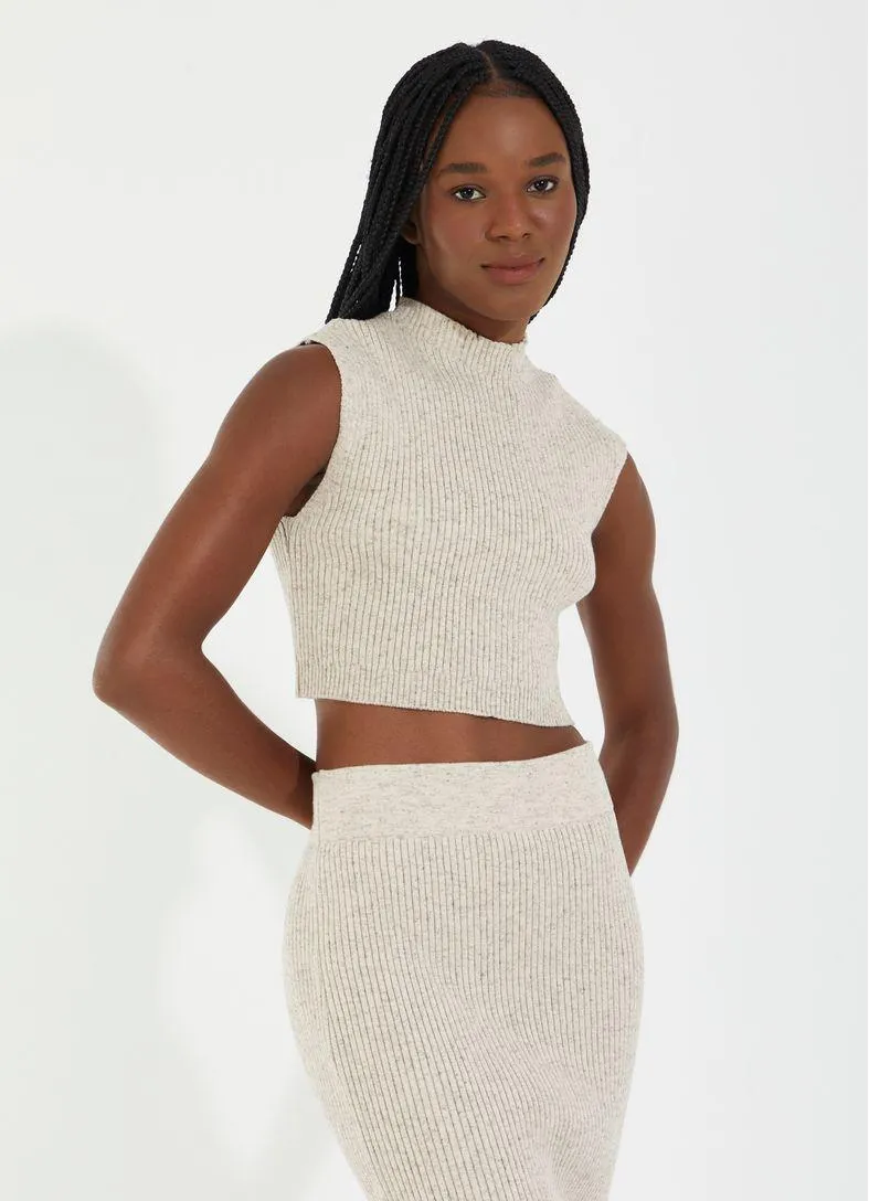 Blusa tricô colab camila coutinho areia