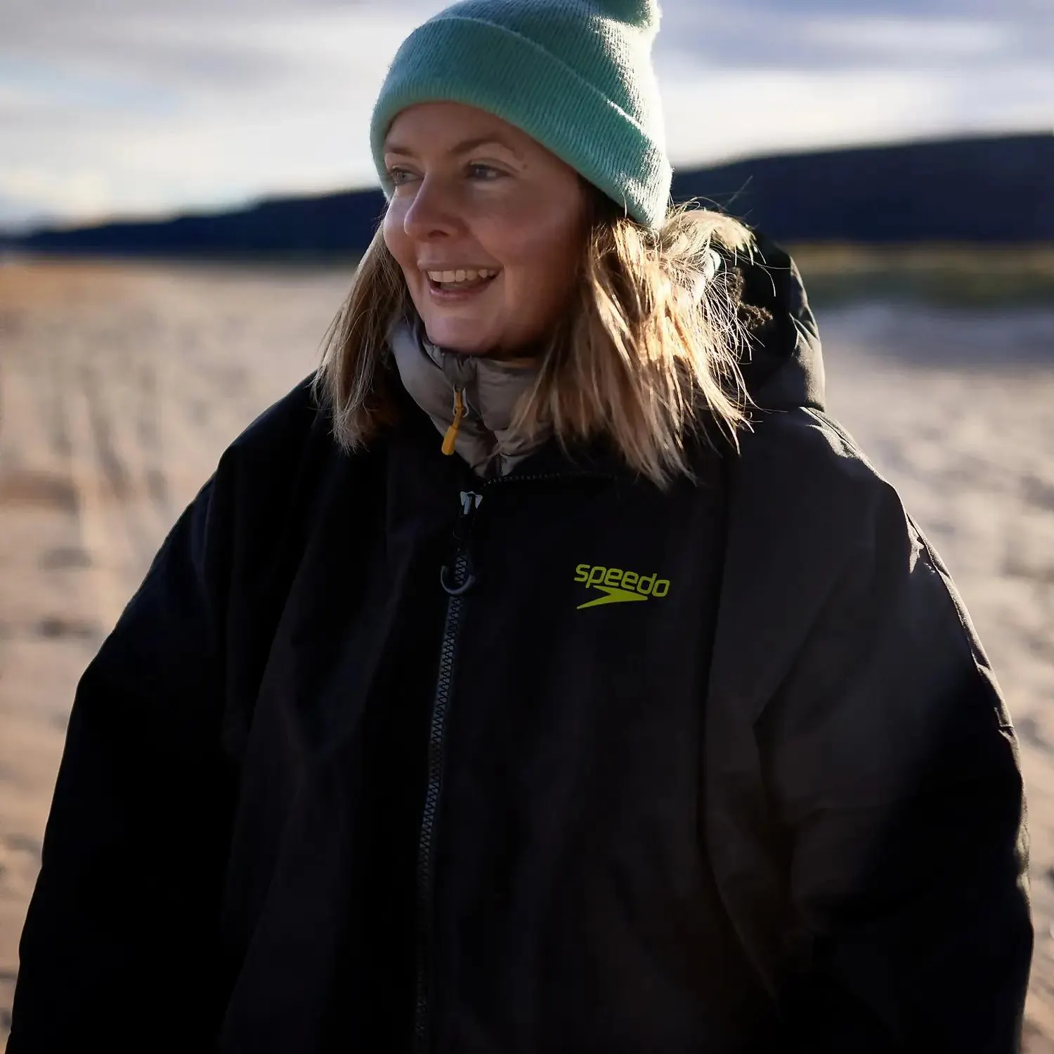 Bata térmica de cambio para secarse para adulto en negro/verde