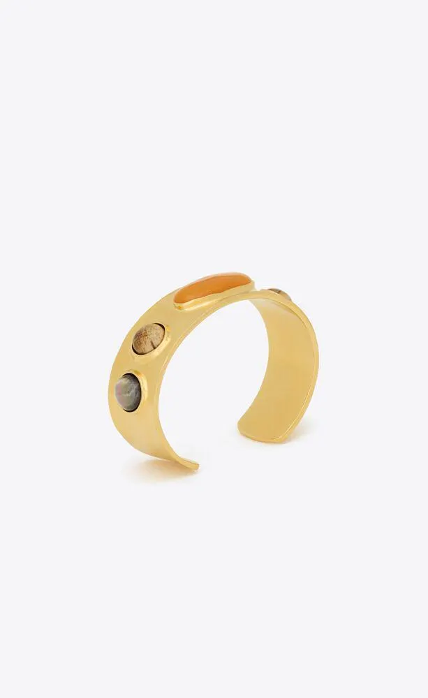 brazalete artístico de metal y cabujones