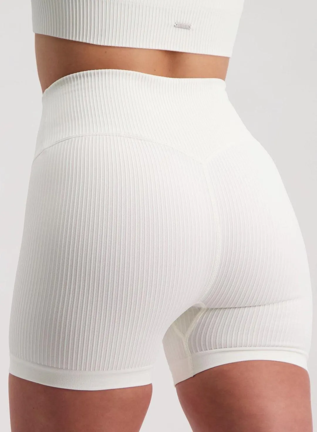 OFF-WHITE RIBBED MIDI BIKER SHORTS