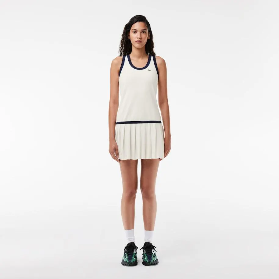 Vestido en tejido de rizo con falda plisada y ribete a contraste