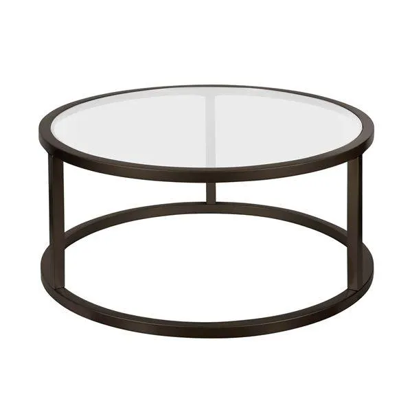 Table basse ronde Parker de Hailey Home noir avec surface en verre