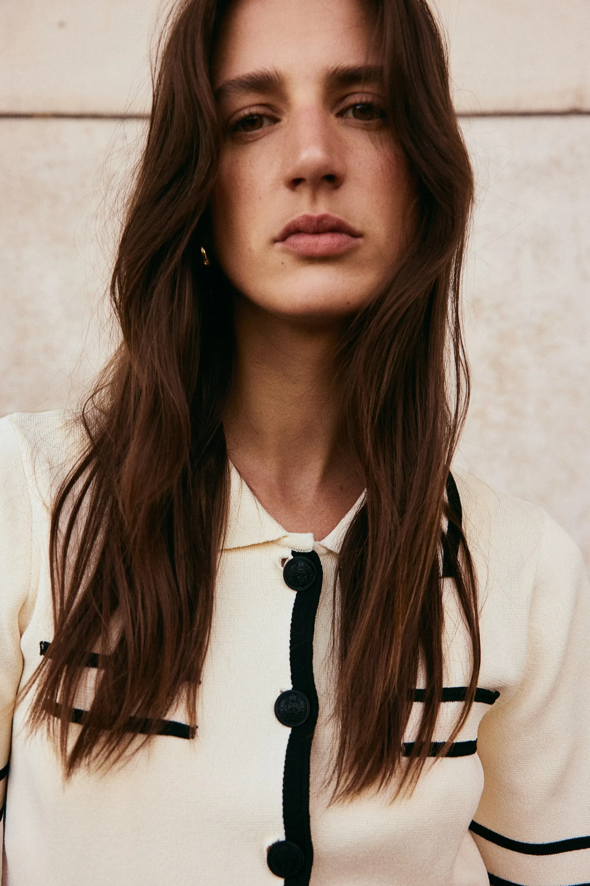 Kauluksellinen neuletakki