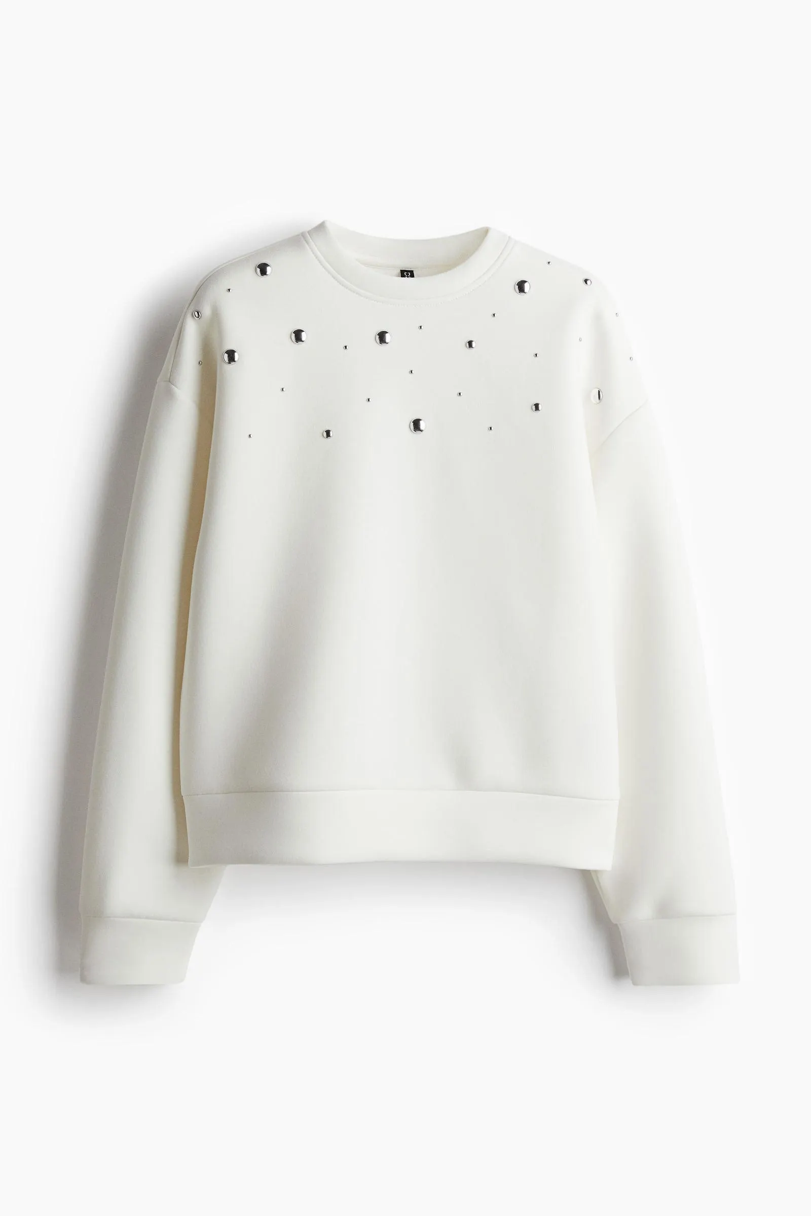 Polerón efecto neopreno con tachas