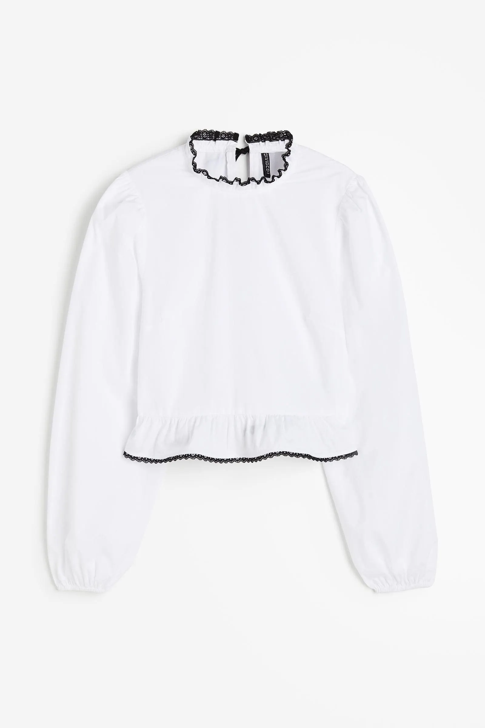 Blusa de mangas globo con peplum