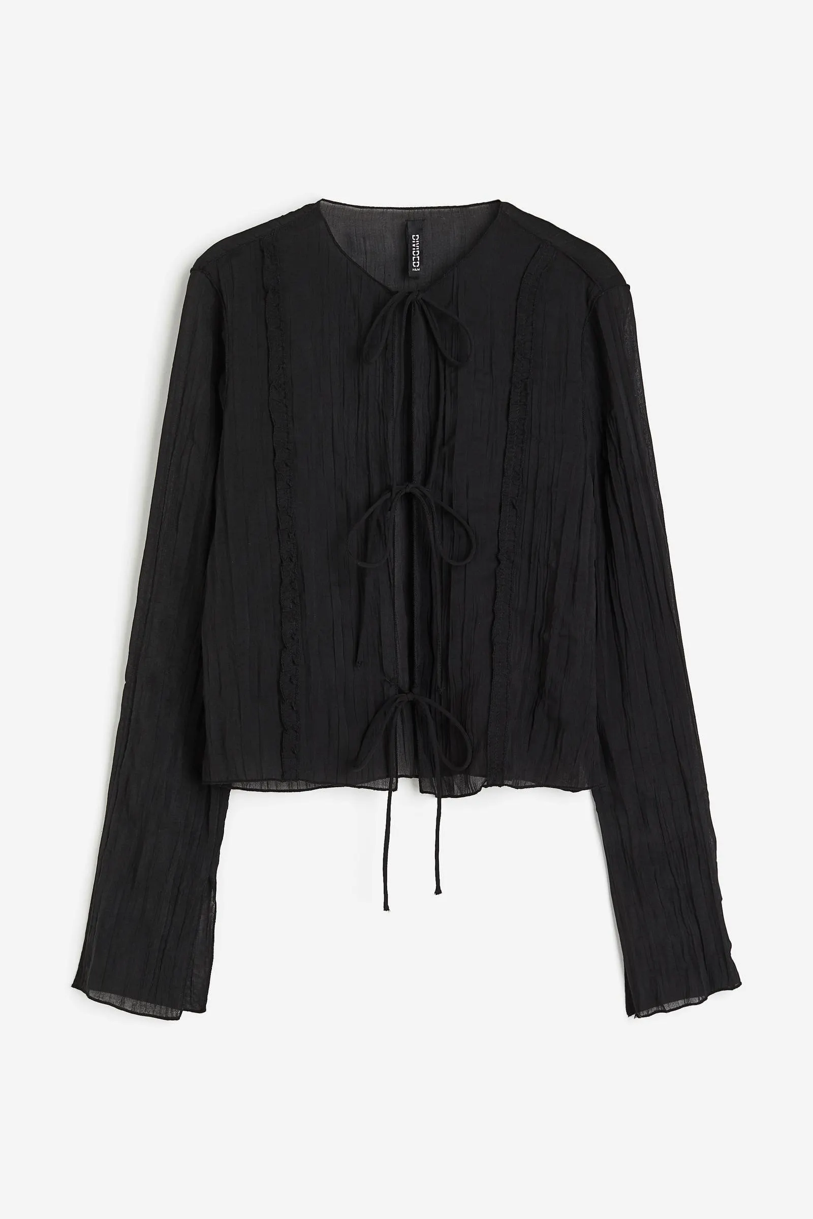 Top vaporoso con lazadas