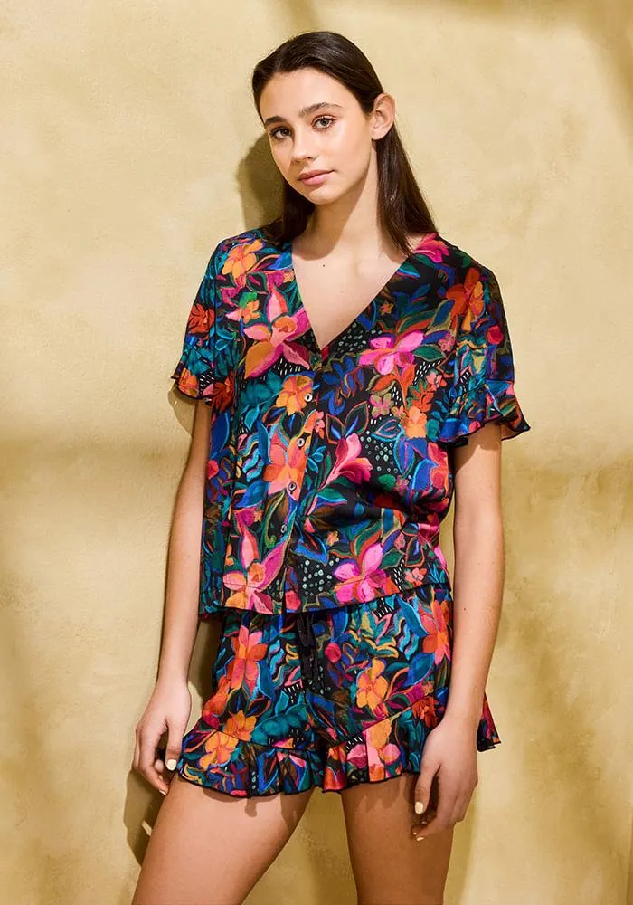 Pijama estampado con vuelos en blusa y short
