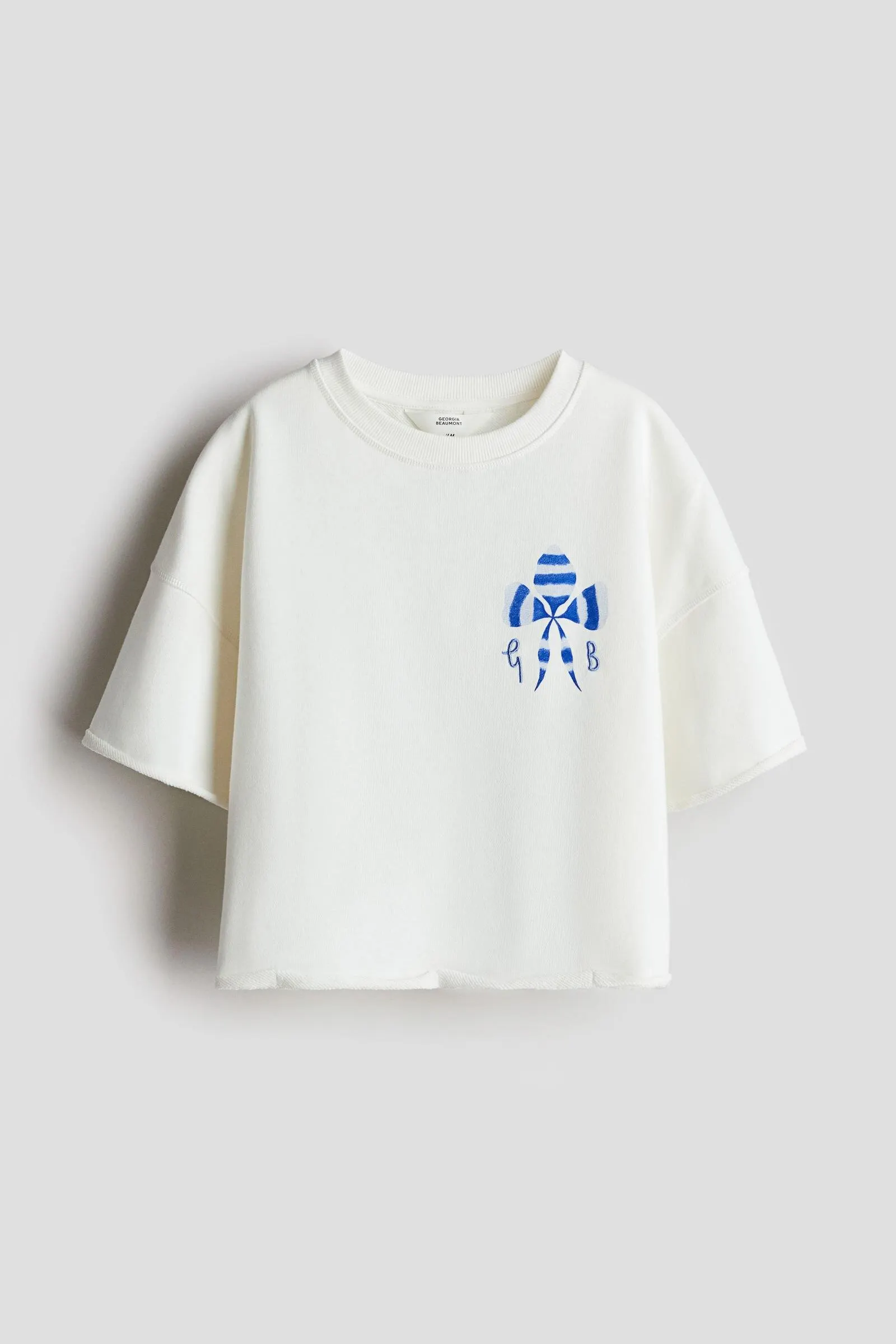 Polera oversize con motivo estampado