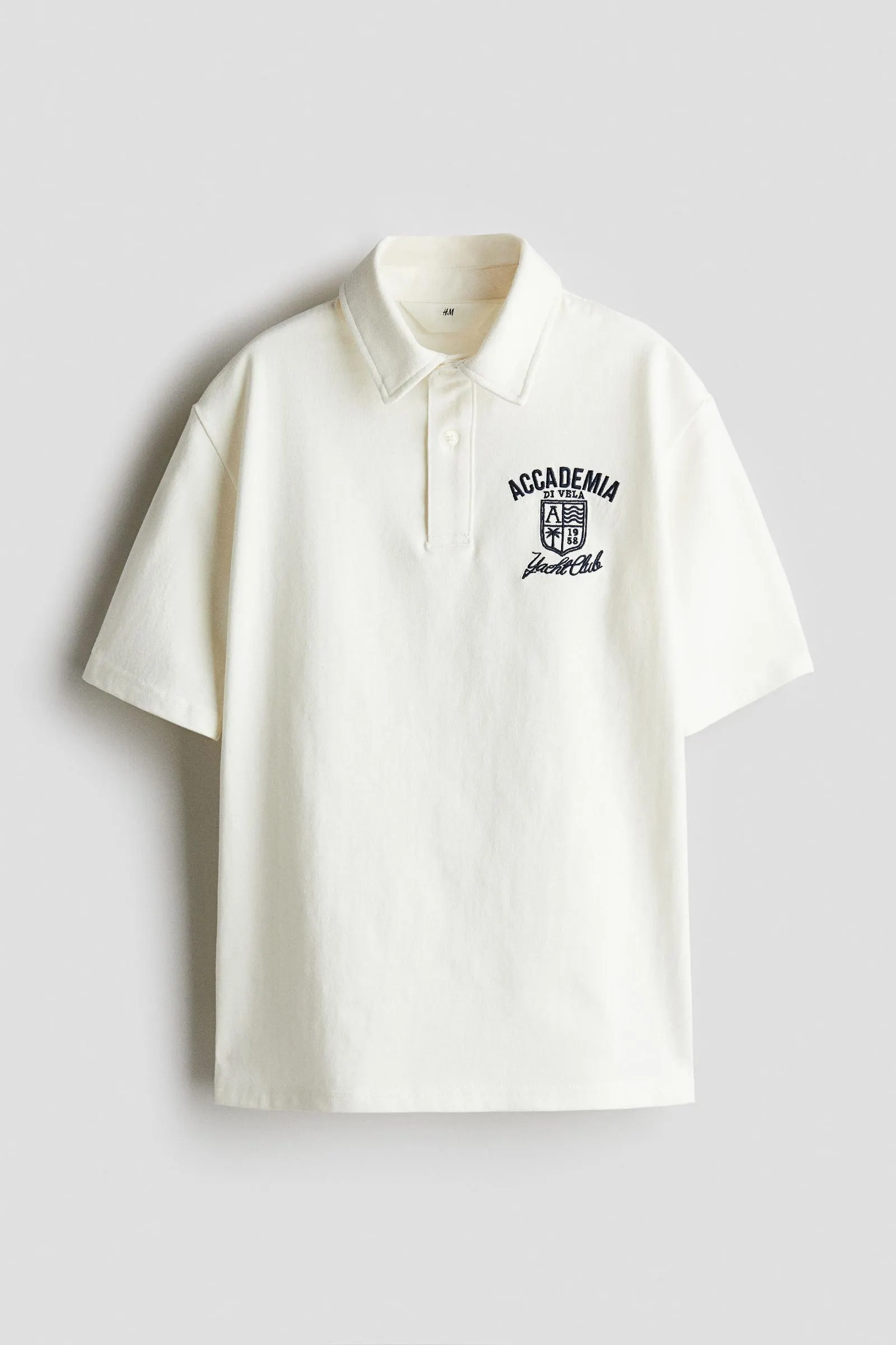 Polera polo con motivo de texto