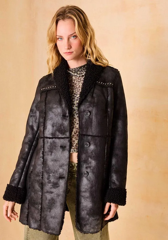 Chaqueta gamulán con sherpa