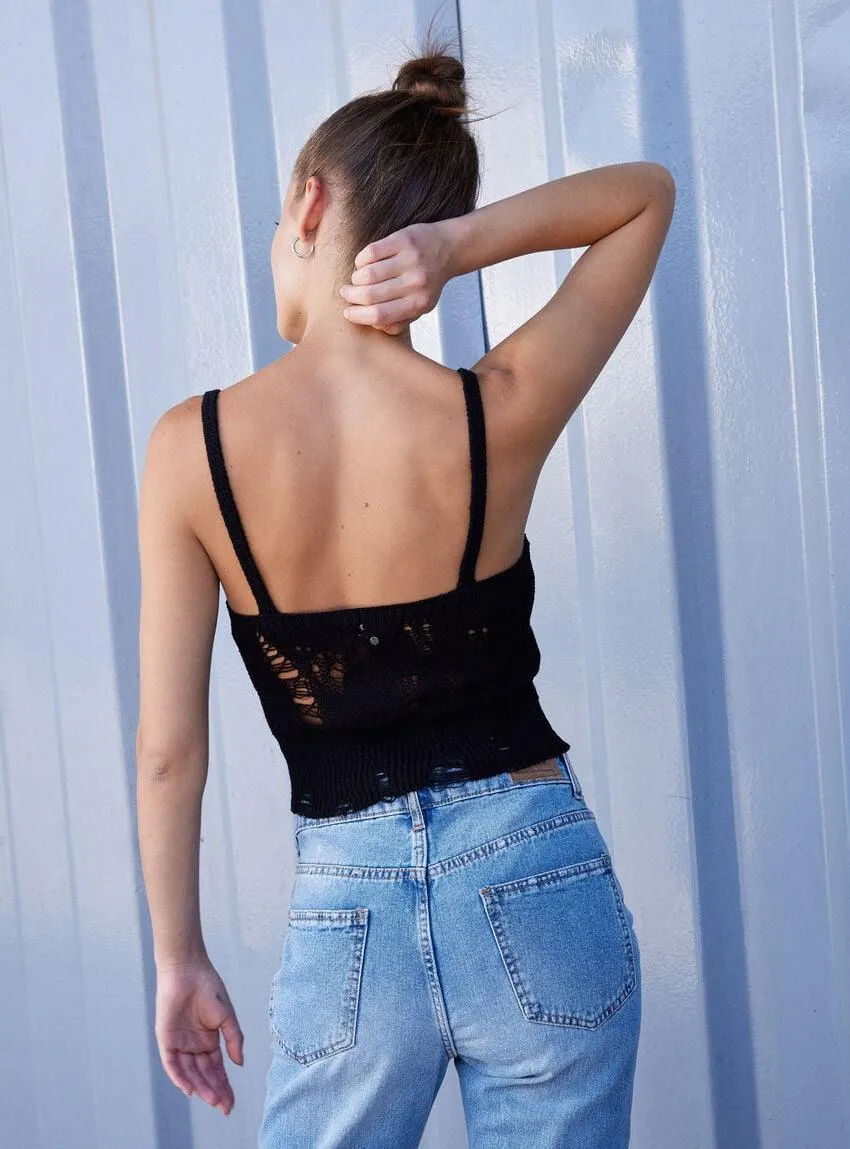 Peto Tejido Con Roturas