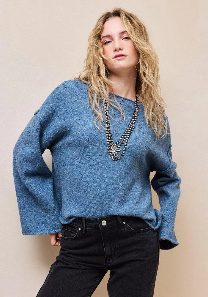 Sweater con detalles de colores en tejido