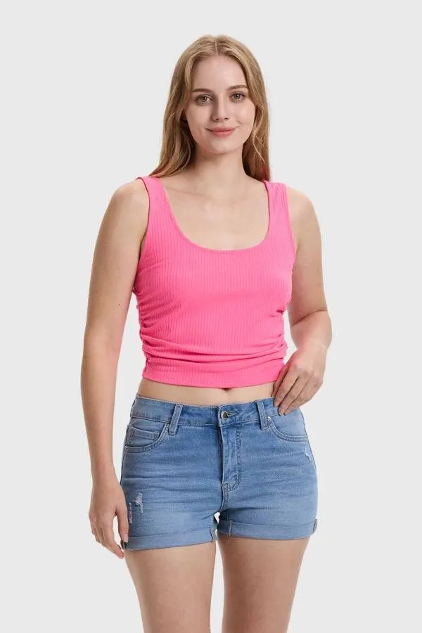 Polera mujer recojido fucsia fluor